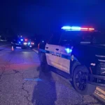 Police investigate a fatal pickup and semi-truck crash near an intersection in Wheat Ridge, Colorado