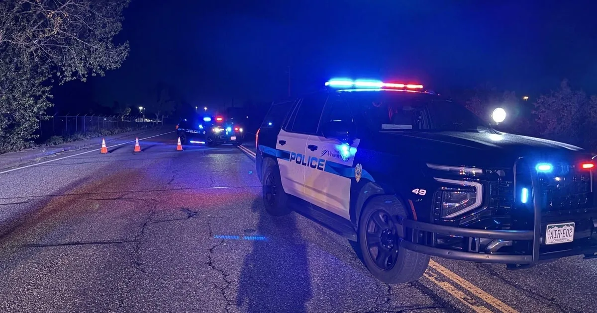Police investigate a fatal pickup and semi-truck crash near an intersection in Wheat Ridge, Colorado