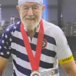 Jim Brien rides with other cyclists during a 9/11 memorial ride
