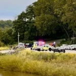 Emergency crews search along the Iowa River in Iowa City after a field trip accident