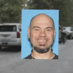 Sheriff's deputies and fire crews respond in rugged Iowa Hill terrain after a deadly shootout