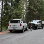 Sheriff's deputies and tactical teams searched steep forest terrain in Placer County after a deadly manhunt