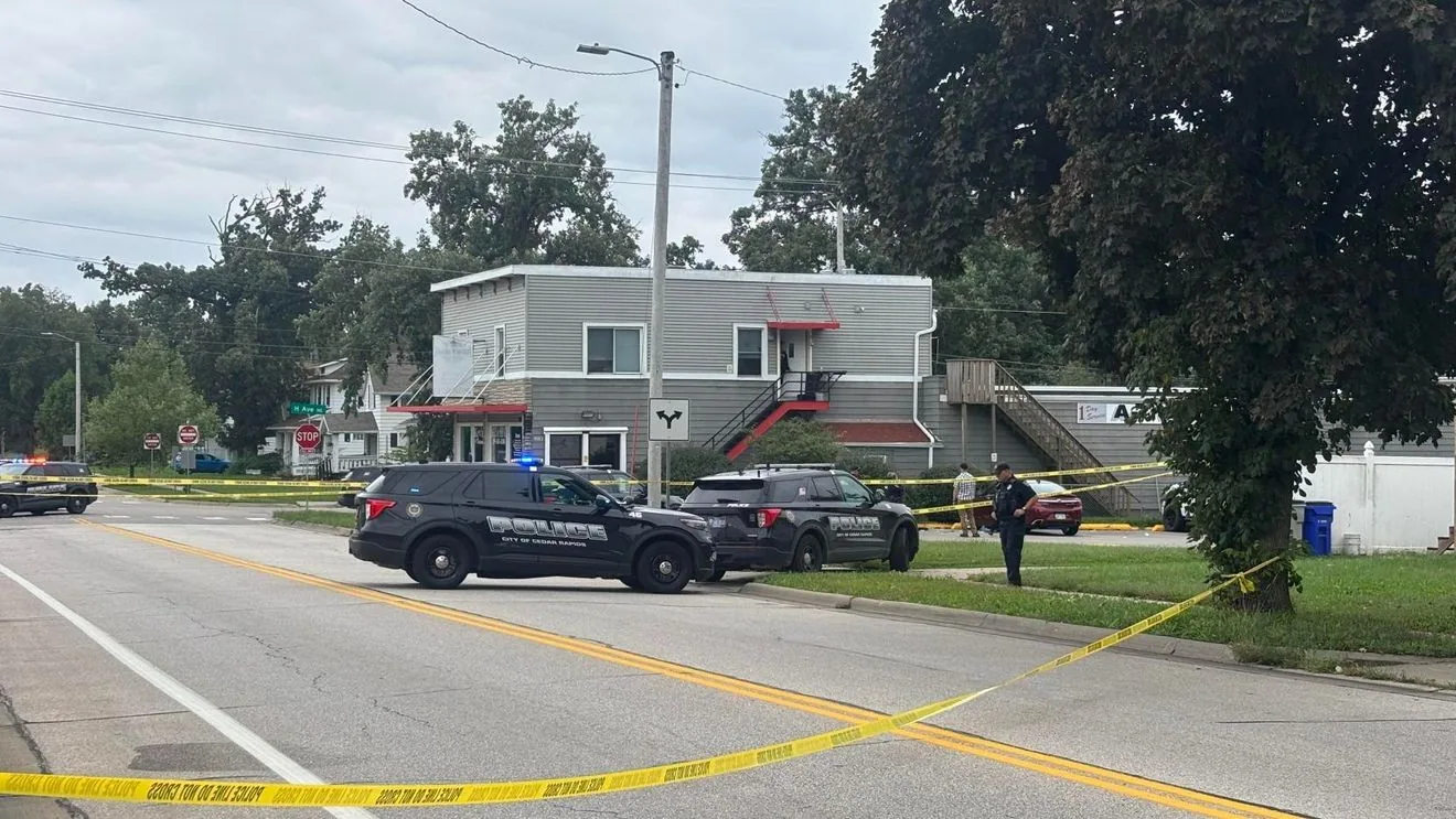Police tape near a Cedar Rapids street after an officer-involved shooting